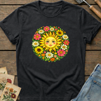 Radiant Sun Face in Black - Comfort Colors 1717 flat lay