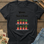 Warning Talks to Plants T-Shirt in Black - Comfort Colors 1717 flat lay