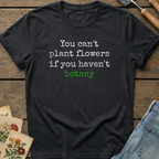 You Can't Plant Flowers T-Shirt in Black - Comfort Colors 1717 flat lay